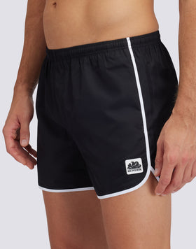 SHORT SWIMSHORTS WITH ELASTICATED WAIST AND ROUND SIDE SLITS